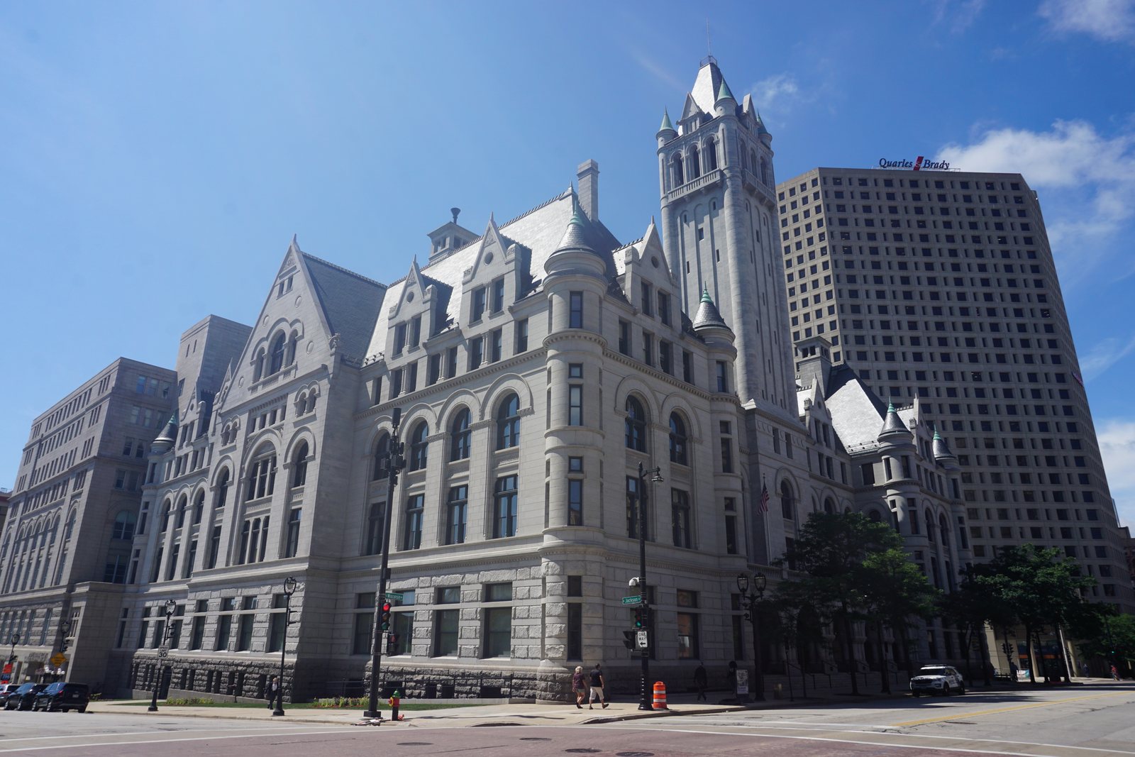 The Federal Building in downtown Milwaukee, a grey stone building with turrets and a tall tower